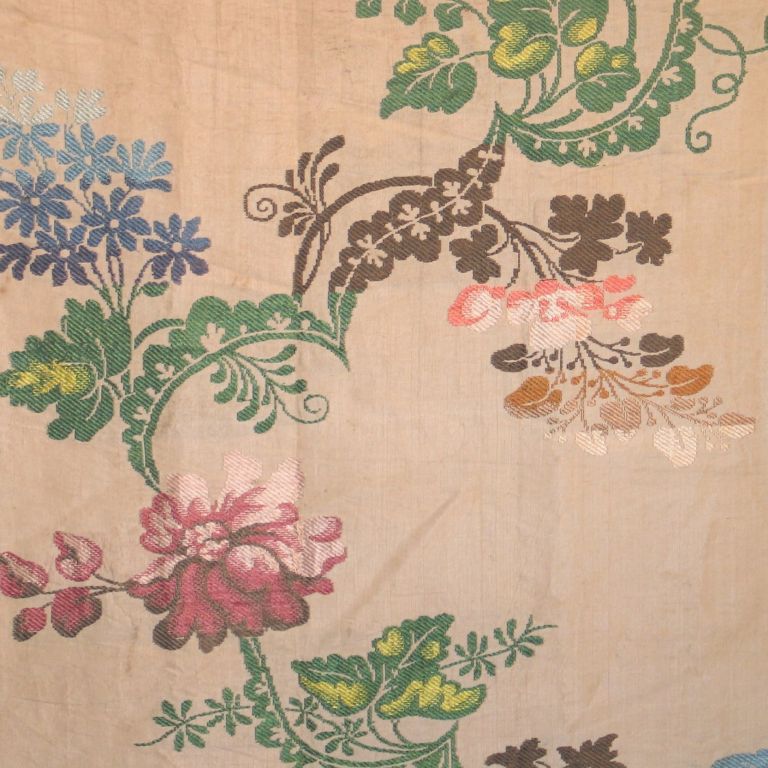 Dutch cream colored silk brocade, brocaded in floral meanders of violet, blue, peach, green, and brown.