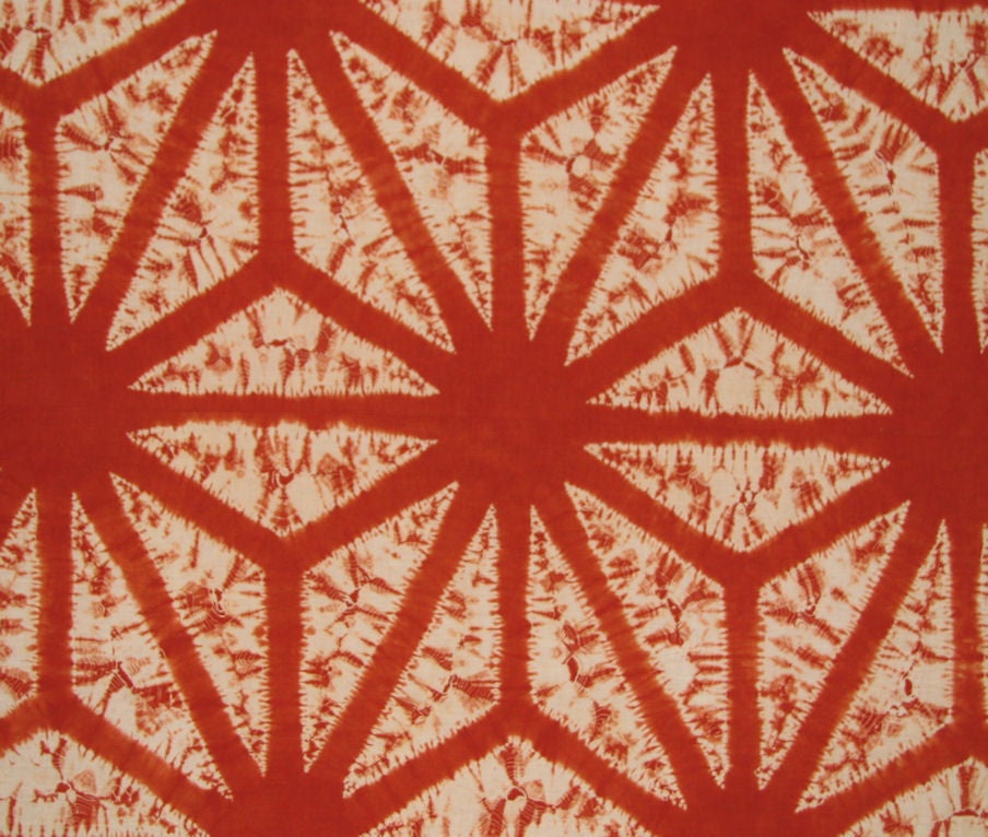 Early 20th century Japanese futon cover called Akane shibori from Iwate Prefecture.  The commercial, hand woven cotton has been resist dyed (shibori) with Japanese madder (rubia akane) to achieve this brilliant color.