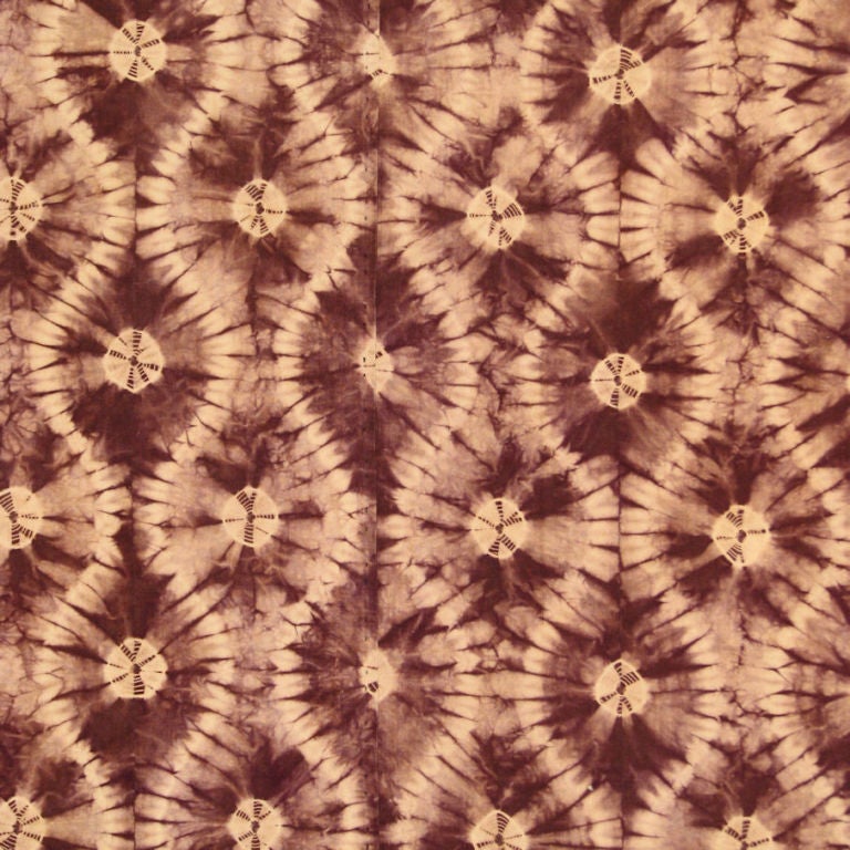 Early 20th century Japanese futon cover, resist-dyed (shibori) in an aubergine color on a cotton ground.