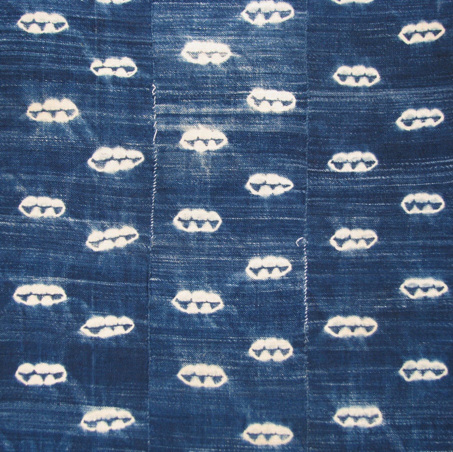 20th C. Mali indigo resist dyed cotton cover with designs resembling clouds or cowry shells.