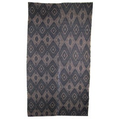Cotton cover with supplementary weft geometric design.