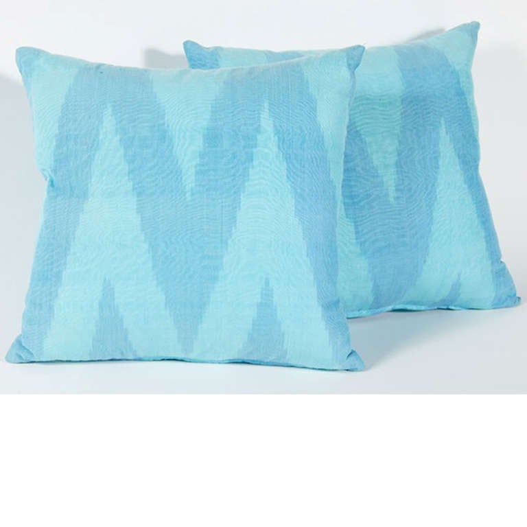 A vibrant blue silk ikat pillow.