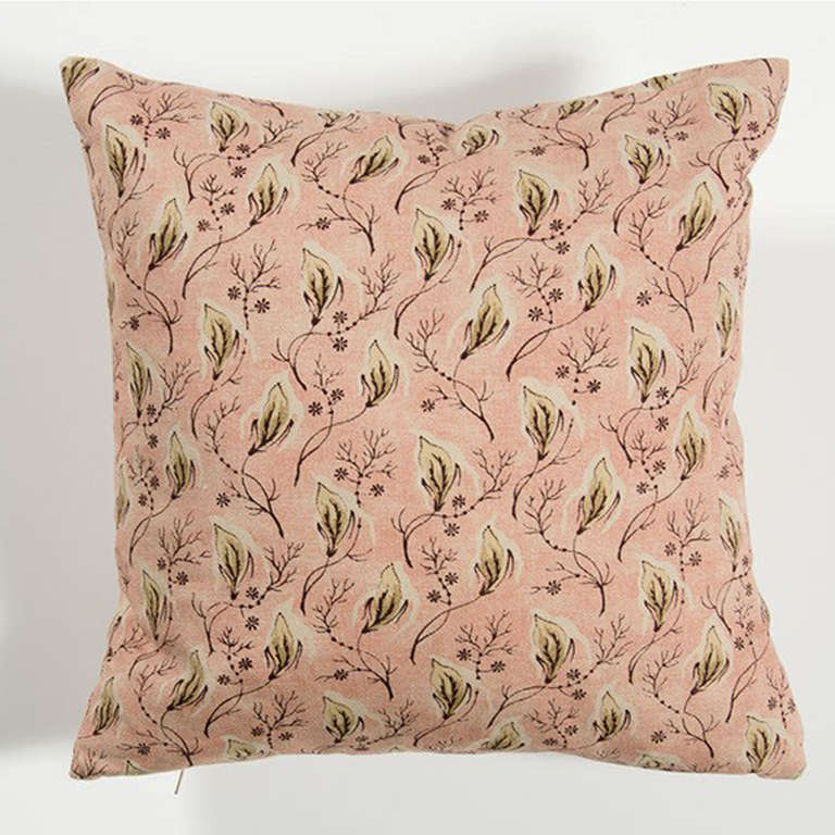 pink pillow made with Rosa Bernal Fabric with nature inspired print