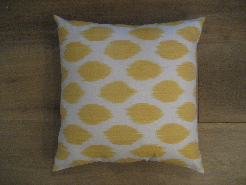 Beautiful yellow cotton ikat pillow. Zippered opening in back. Available in yellow, orange, black, and brown.