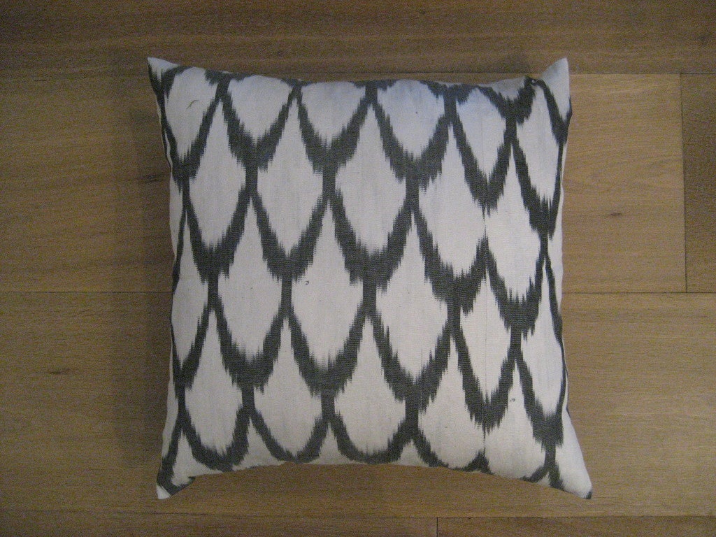 Beautiful cotton ikat pillow. Zippered opening in back.
