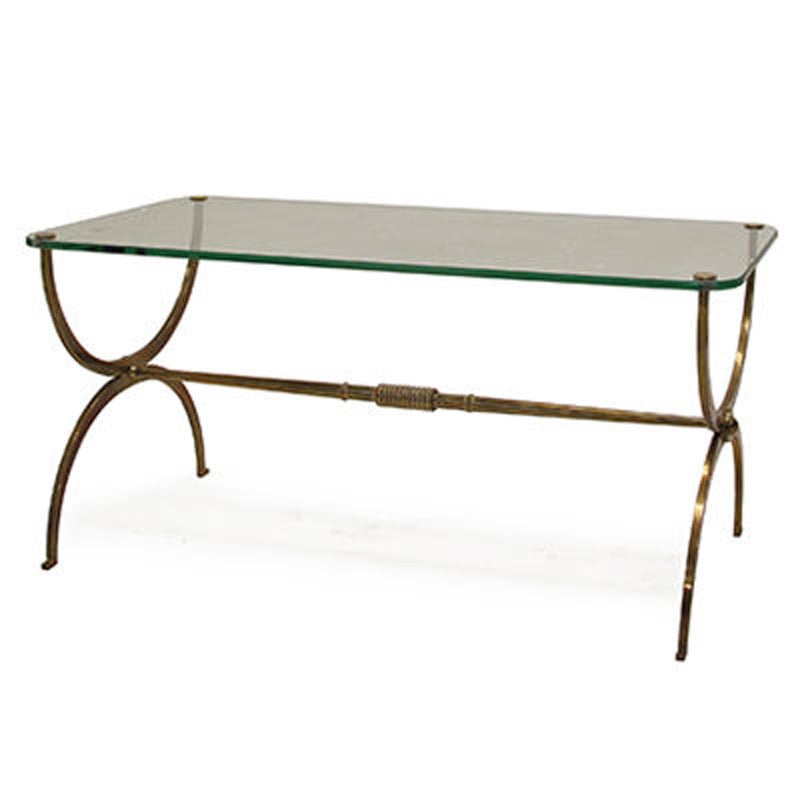 Brass curved X base coffee table with glass top and brass stretcher - French, 1940's.