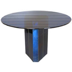 B and B Italia round dining table with blue metal pedestal