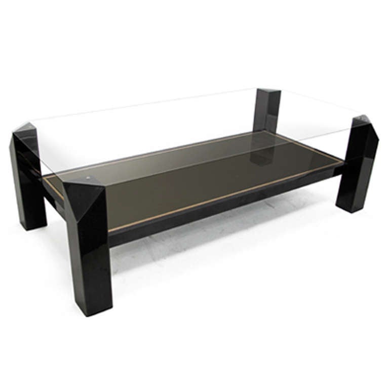 Vintage two tier black metal and brass coffee table with cut corners and mirrored bottom shelf - France, 1970's.