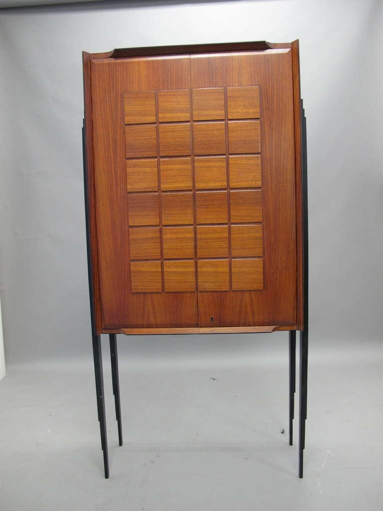 Vintage tall palisander cabinet with bronze legs and square grid relief motif - Italy 1960's
