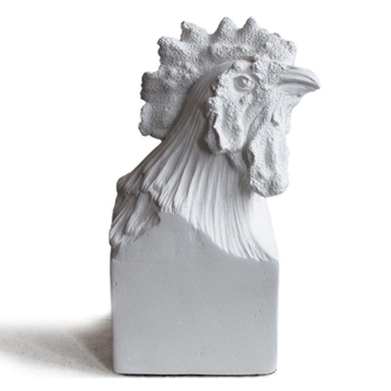 Cockerel white plaster objet, handcrafted by George Sellers. 

Dallas based sculptor George Sellers studied in Italy, where he was trained in the traditional methods by a master carver. He creates seductively gothic home furnishings and objet