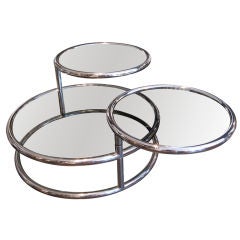 1970's Glass and Chrome Coffee Table with Three Swivel Plateaus