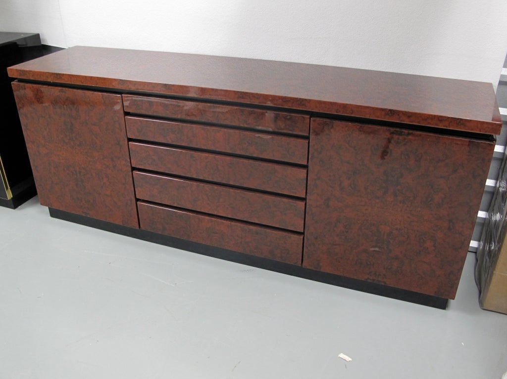 Dark burlwood and black lacquer side board by Jean-Claude Mahey.

As this piece may be in our off-site storage, please call ahead to schedule a viewing.