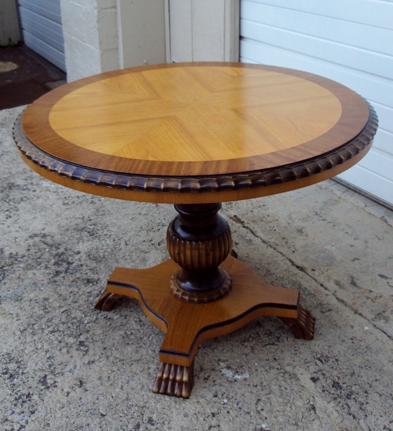  Handsome end or side table of golden book-matched elm on a golden flame birch pedestal with ebonized accents