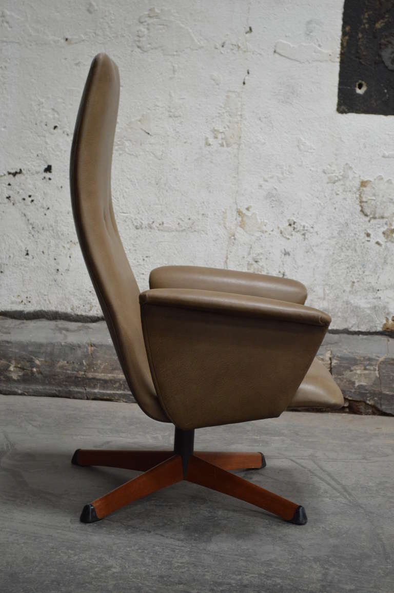 mid century leather swivel chair
