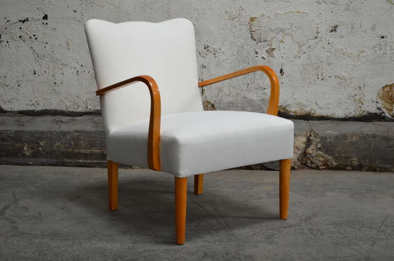 Swedish Art Deco arm chair with scalloped top.  Originally mean to have a channeled inside back, but shown here in a new muslin cover after being completed restored.  Price includes reupholstery in COM fabric.

COM required:  Three (3) yards of