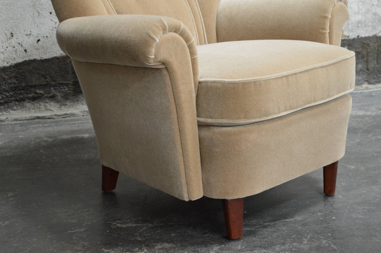 Striking single club chair of with new taupe mohair upholstery. Completely restored with eight way hand-tied springs and new padding for updated comfort.