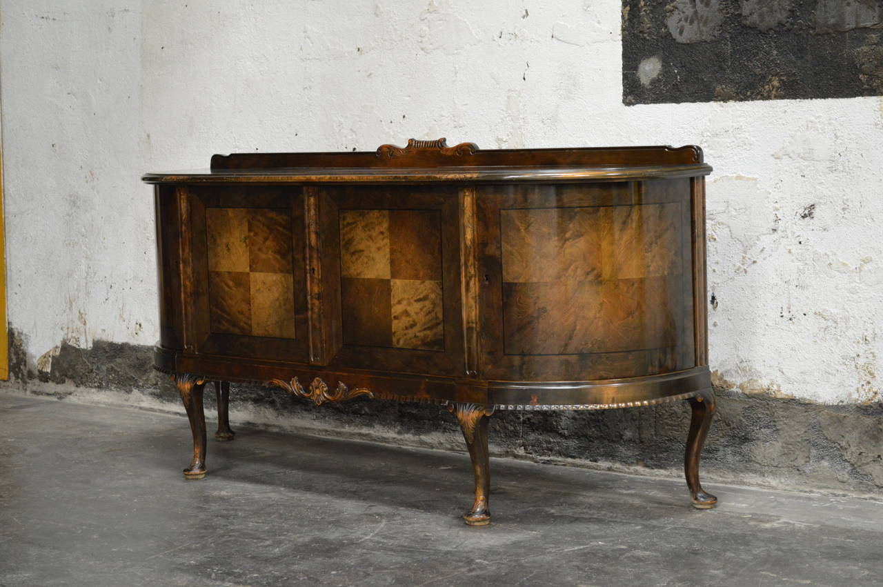 Gorgeous Swedish neoclassical buffet, sideboard or server with dark flame birch book matched doors with ebony intarsia. 2 curved doors on the sides and 2 center doors open to reveal mahogany shelving and two drawers. Beautifully detailed with