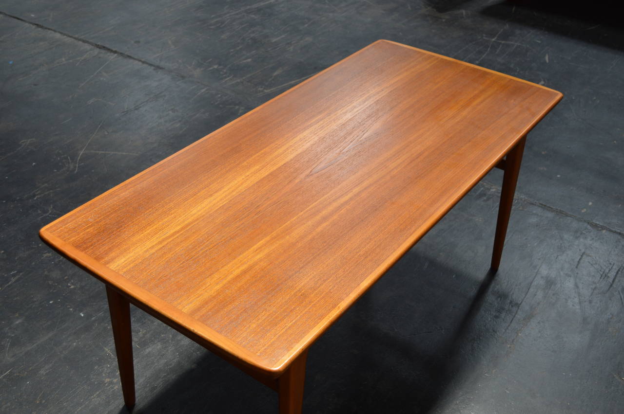 1960s Swedish. Original finish. Converts from a coffee table to a game/dining table. Clever expandable function works easily. Sturdy in all positions.

Dimensions
23.5