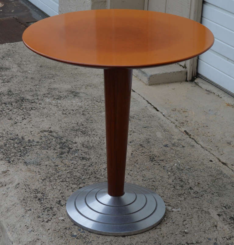 Art Moderne Style Pedestal Side Table with Metal Base. Top made of engineered wood done in a graduated ring ombre pattern sitting a top a tapered wooden and metal base.  The perfect size for a small dining area or for use as a stylish end table.