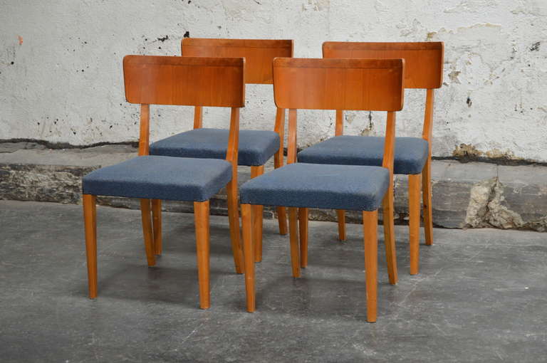 Set of four dining chairs - Shown with original upholstery however price includes reupholstery in COM fabric. Beautiful elm chairs detailed with carpathain elm along the top of the the back. 

Please contact us with any questions!
