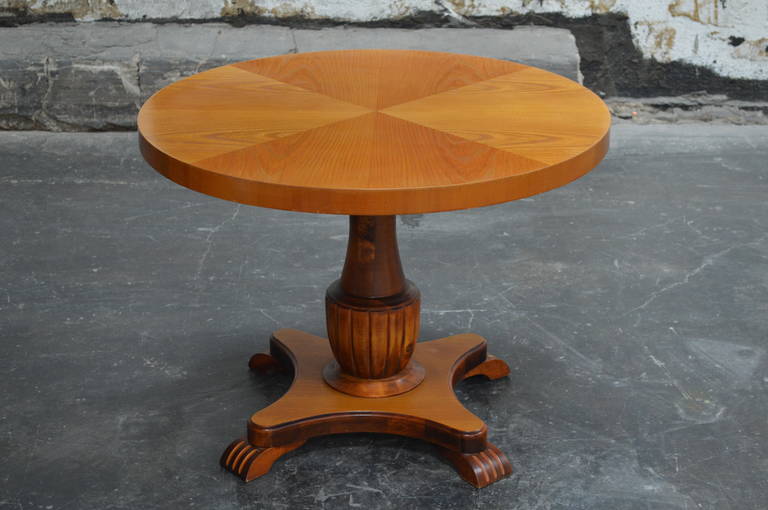 Swedish Art Deco round golden elm end or side table. Beautifully detailed pedestal base made of flame birch.