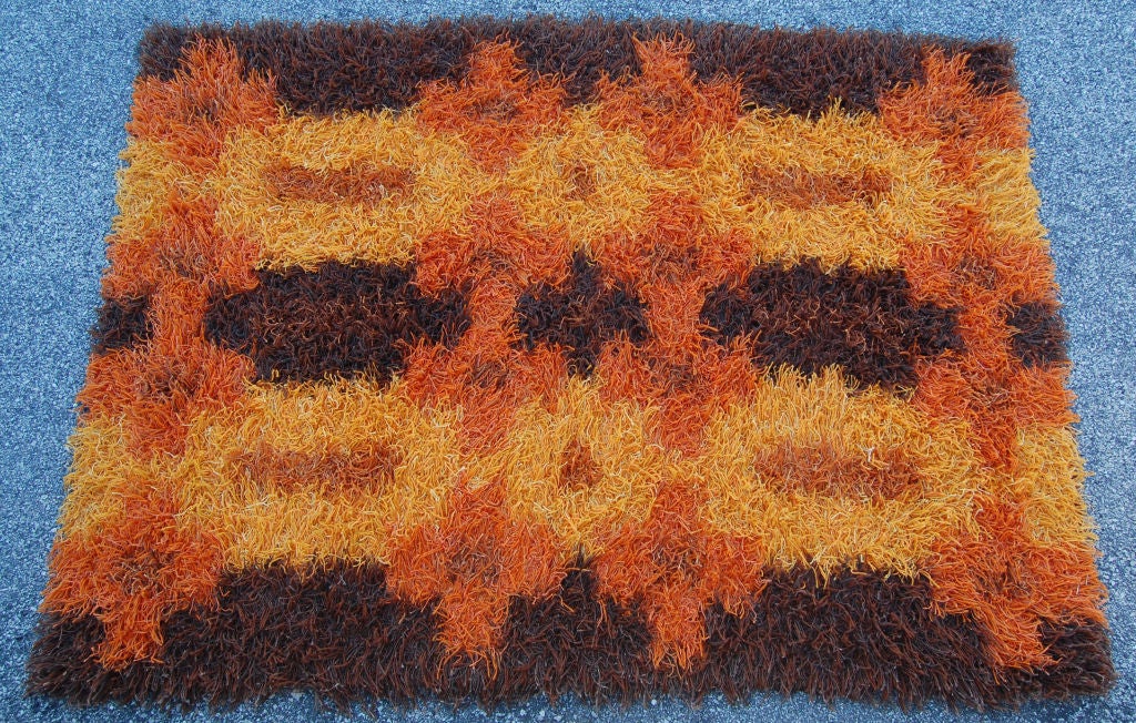 Vintage 1960's Swedish Modern rya rug in oranges and brown by Tabergs.  Original label on back of rug.