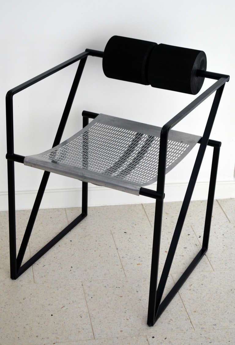 Vintage modern Seconda 602 chair designed by Mario Botta and made by Alias in the 1980's.  Black enameled steel frame with two cylindrical polyurethane backrest cushions, signed 