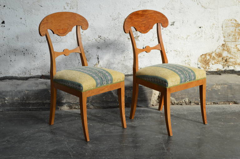 Pair of Swedish Biedermeier side chairs with shovel-shaped backrest and decorative horizontal center bar. Ready to be upholstered in your COM fabric. Price includes upholstery.