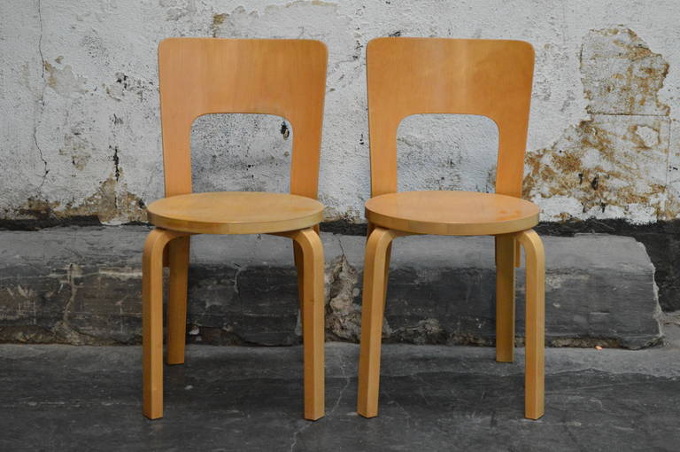 Pair of early No. 66 chairs by Alvar Aalto for Artek in beechwood