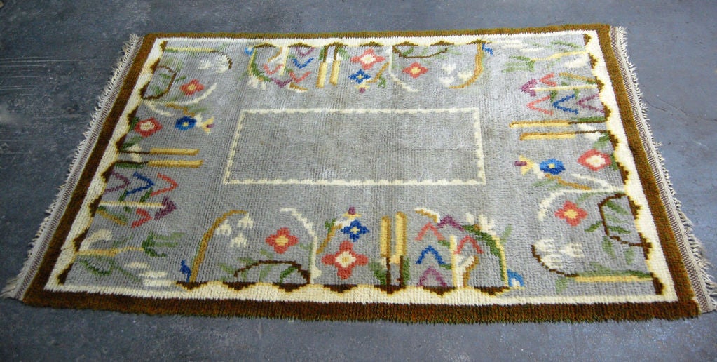 Rya Rug - Colorful floral design. Brown and Ivory trim with colorful botanical floral border. Beautiful warm texture.
