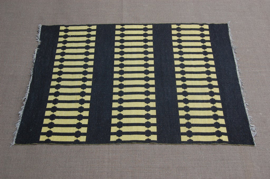 Vintage Swedish Minimalist Modern Black and Citrine Railroad Track Striped Flat Woven Rug or Kilim.<br />
<br />
Its flat woven pattern is equally visible on both sides making it reversible.<br />
<br />
Flat woven rugs are even suitable for use