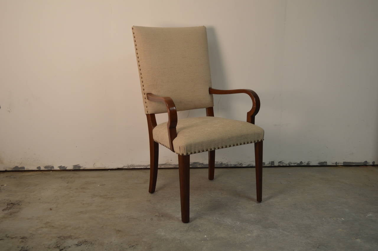 -Stylized curved arms.

-Handcrafted mahogany frame.

-Hardwood inner frames.

-New beige chenille upholstery fabric with spaced nailheads.

-Very comfortable.

Perfectly scaled for a side chair in a living room, desk chair or as an accent chair in