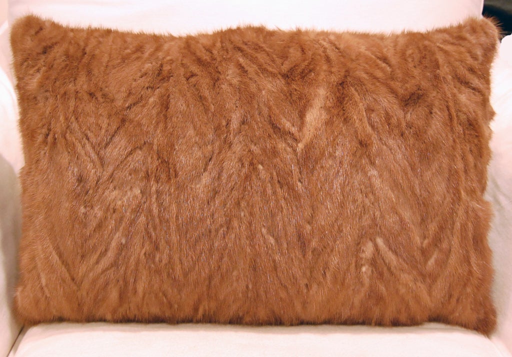 Indulge in the sumptuous feel of fur with this lush impeccably detailed dark blonde mink fur pillow. Made from genuine mink fur reclaimed from clean vintage coat c. 1950's. Variegated shades of dark and light caramel mink fur on the front with new