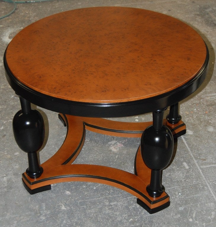 Gorgeous round table crafted of Carpathian Birch with ebonized accents.



Please contact us with any questions!
