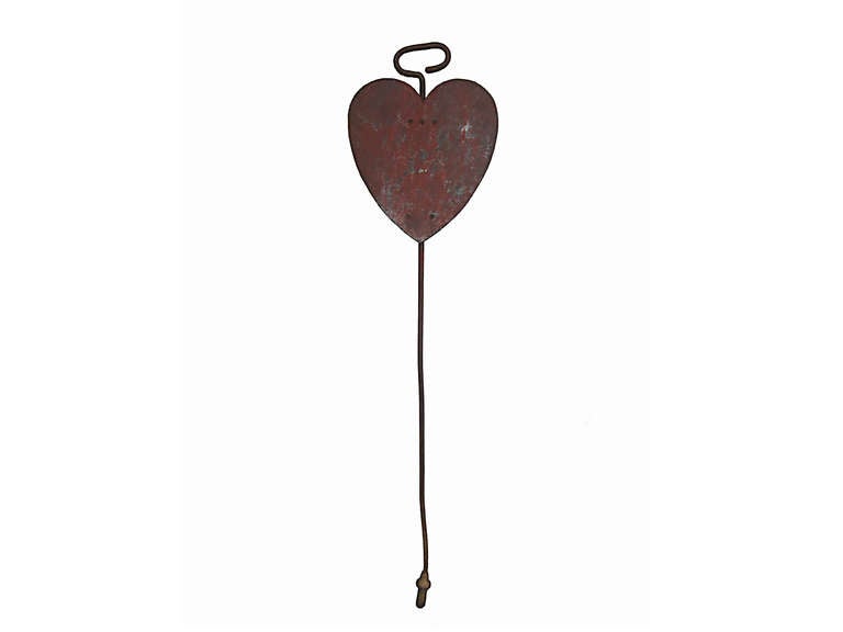 Circa 1920 exceptionally large heart shaped golf marker, unusually marked with the manufacturer's stamp of Crawford, McGregor and Canby, Dayton, Ohio, as found surface and condition, new custom wall bracket.