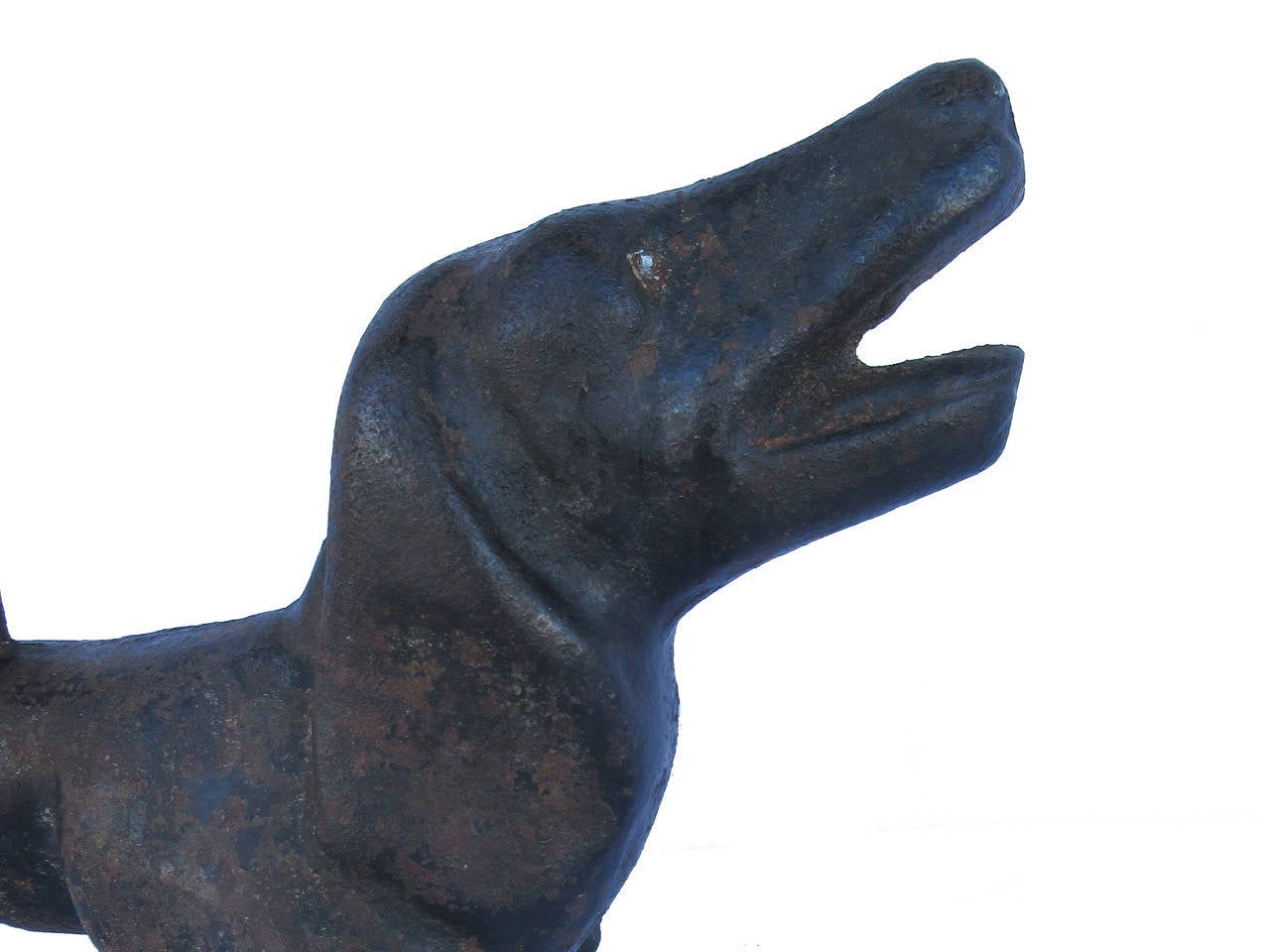 Cast iron dachshund boot scraper in old black painted surface, circa 1900.