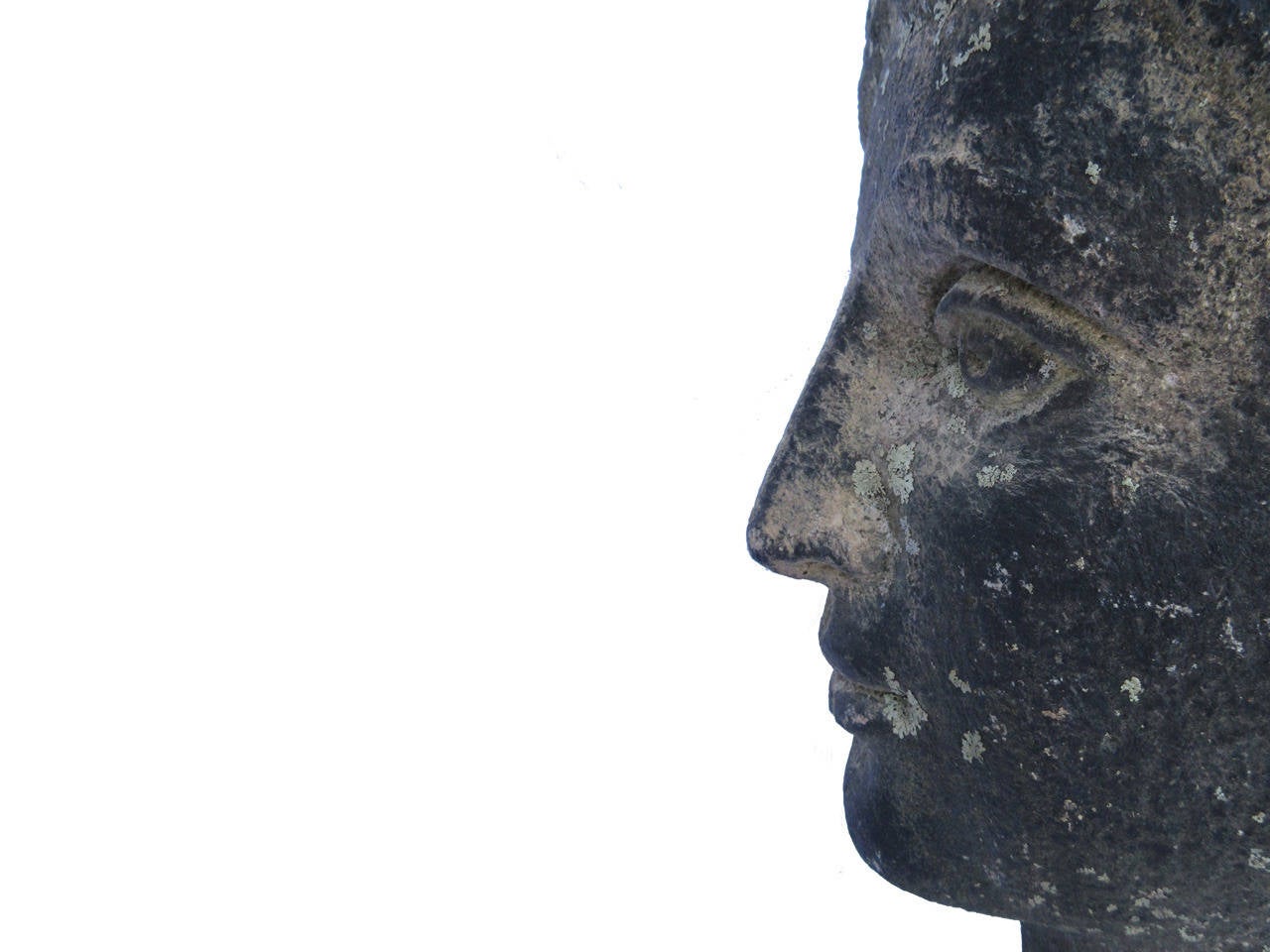 Exceptional large-scale granite head of a woman, carved in great detail and reminiscent of the Goddess of Liberty, removed from the Green Family Estate at Mirror Lake, formerly camp wood crest, Berkshires MA, circa 1850.