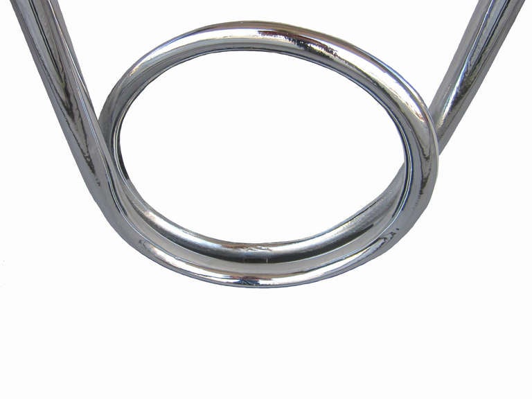 Circa 1930 unusual and oversized metal safety pin used for a store display with later rechromed surface, contemporary base.