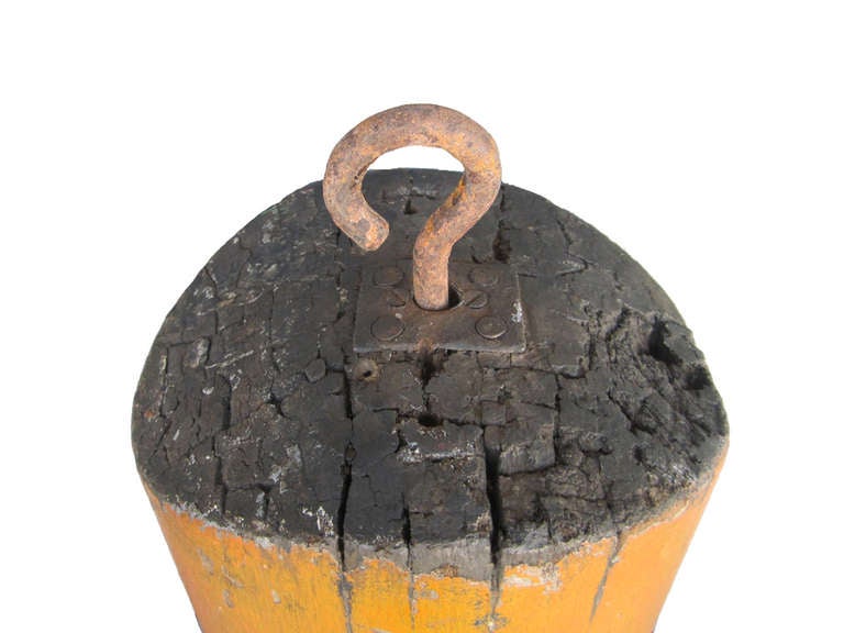 19th century wood boot trade sign in traditional form with an old in use 'make do' tin repair, all in old age cracked bittersweet orange painted surface with black heel.