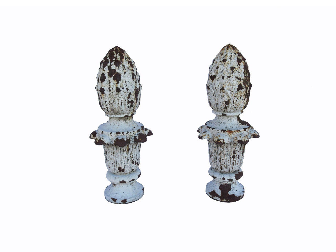 Late 19th century pair large-scale cast iron finials with pineapple and leaf motif, great detailing, thick white age cracked painted surface, excellent condition.