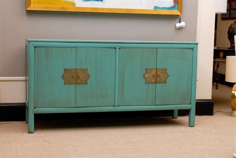 A Beautiful and Rare multi-purpose cabinet by long time Century Furniture Company designer Ray Sabota, circa 1970. Very unusual color, as most of this particular series was produced in Chinese red/orange lacquer. Fabulous solid brass hardware. Great