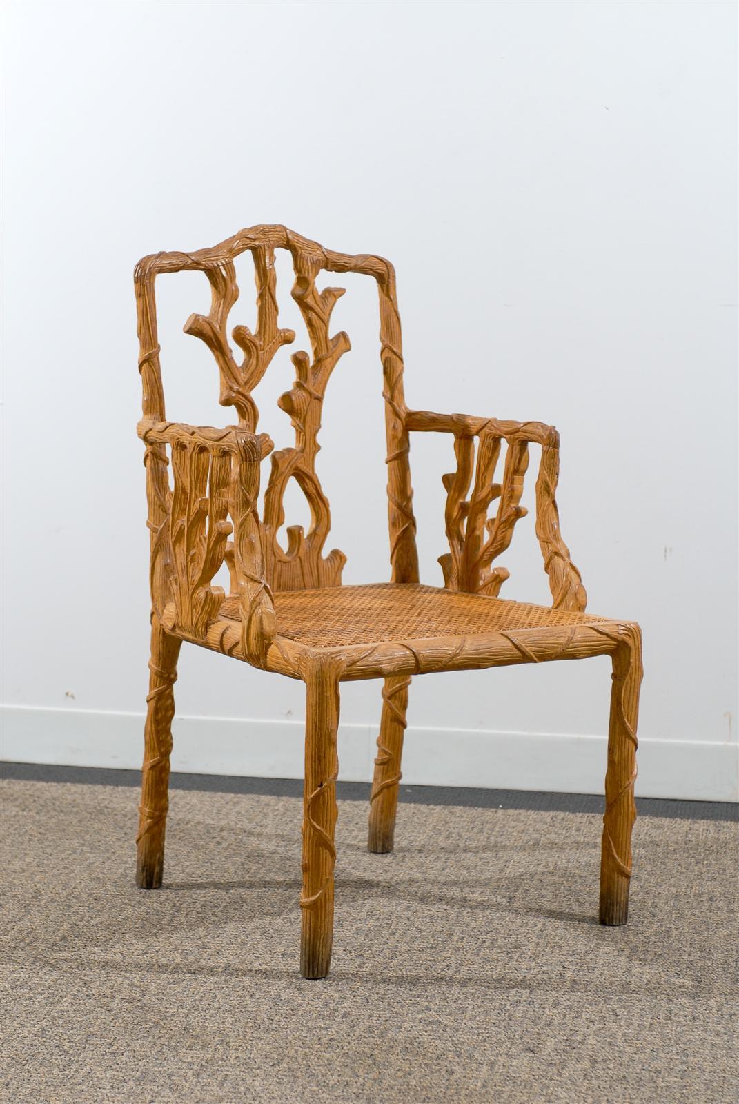 Set of four carved wood twig chairs with caned seats,
circa 1970, origin Spain.