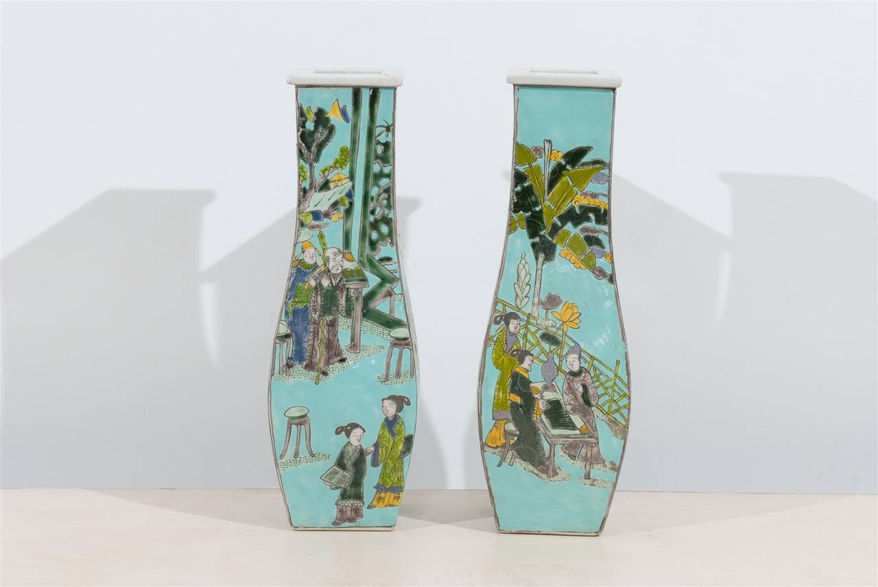 Pair of square and curved Chinese vases with turquoise glaze with green and yellow.