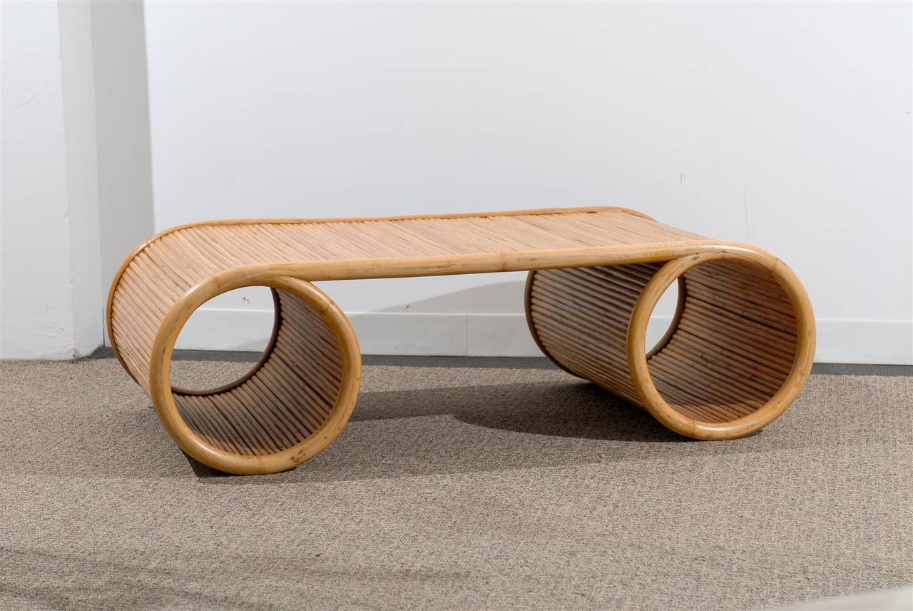 Chic Mid Century Style Coffee Table In split Bamboo on Top and Bottom and interior of circular base.