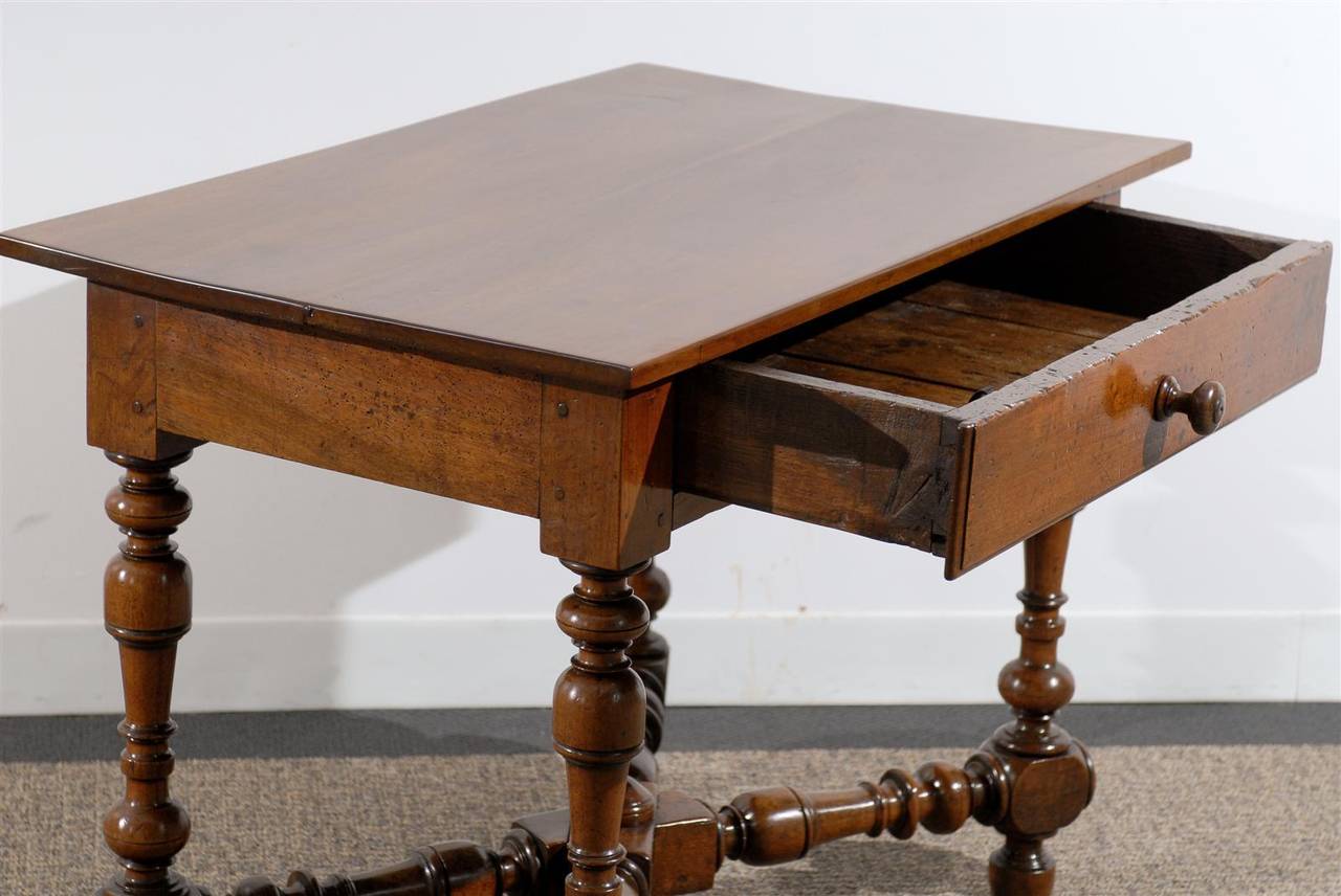 Polished Regence Style Walnut Turned Table with Drawer and Stretcher