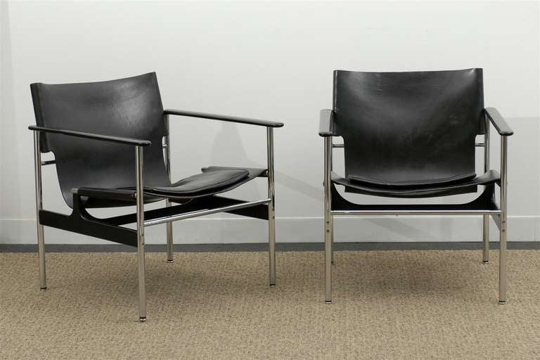 A Beautiful pair of the Rare model 657 leather sling lounge/club chair by Charles Pollock for Knoll, circa 1960. The leather has wonderful patina and is in Excellent Vintage Condition. Chrome is in Excellent Vintage Condition as well. Synthetic