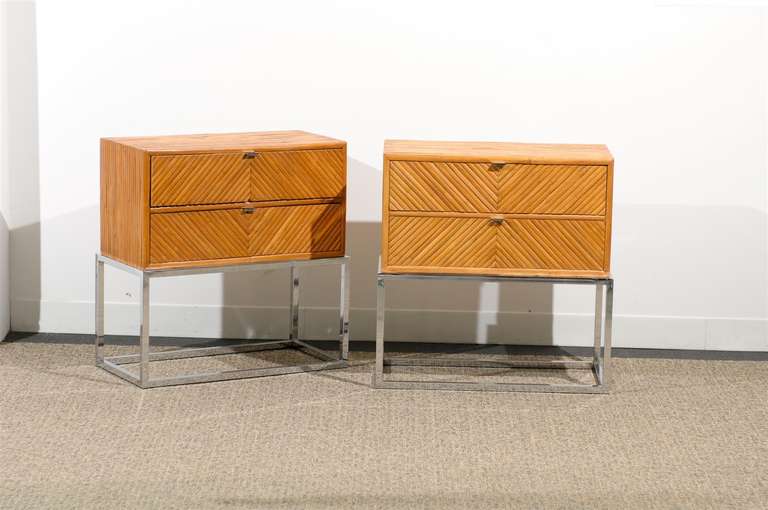 A Gorgeous pair of bamboo and chrome end tables/night stands by Milo Baughman for Thayer Coggin, circa 1970's. Wonderful examples from a rare series. Excellent Vintage Condition. The price noted is for the pair.TOM ROBINSON MODERN at TRAVIS & COMPANY