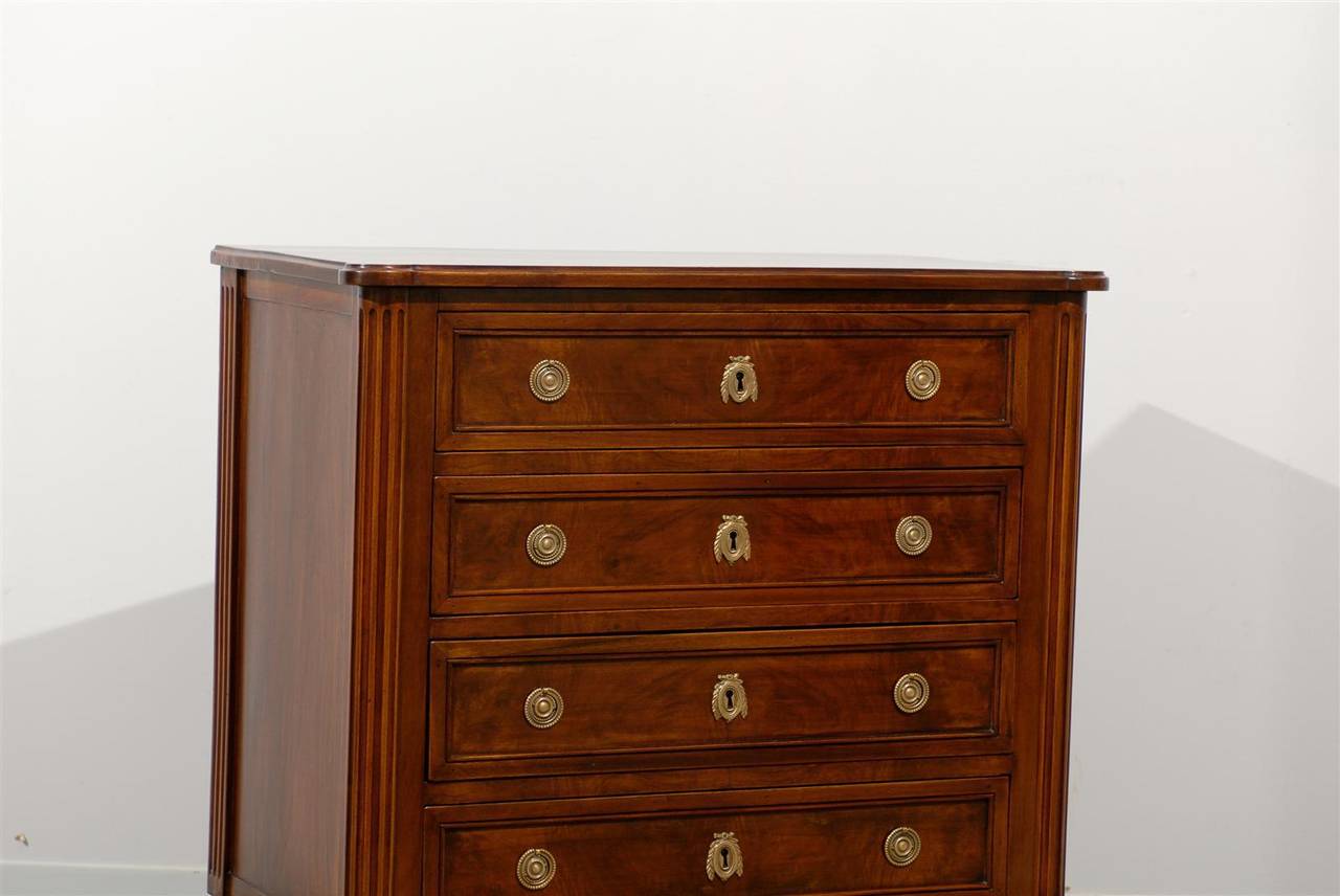 Polished Early 19th Century Louis XVI Four-Drawer Commode