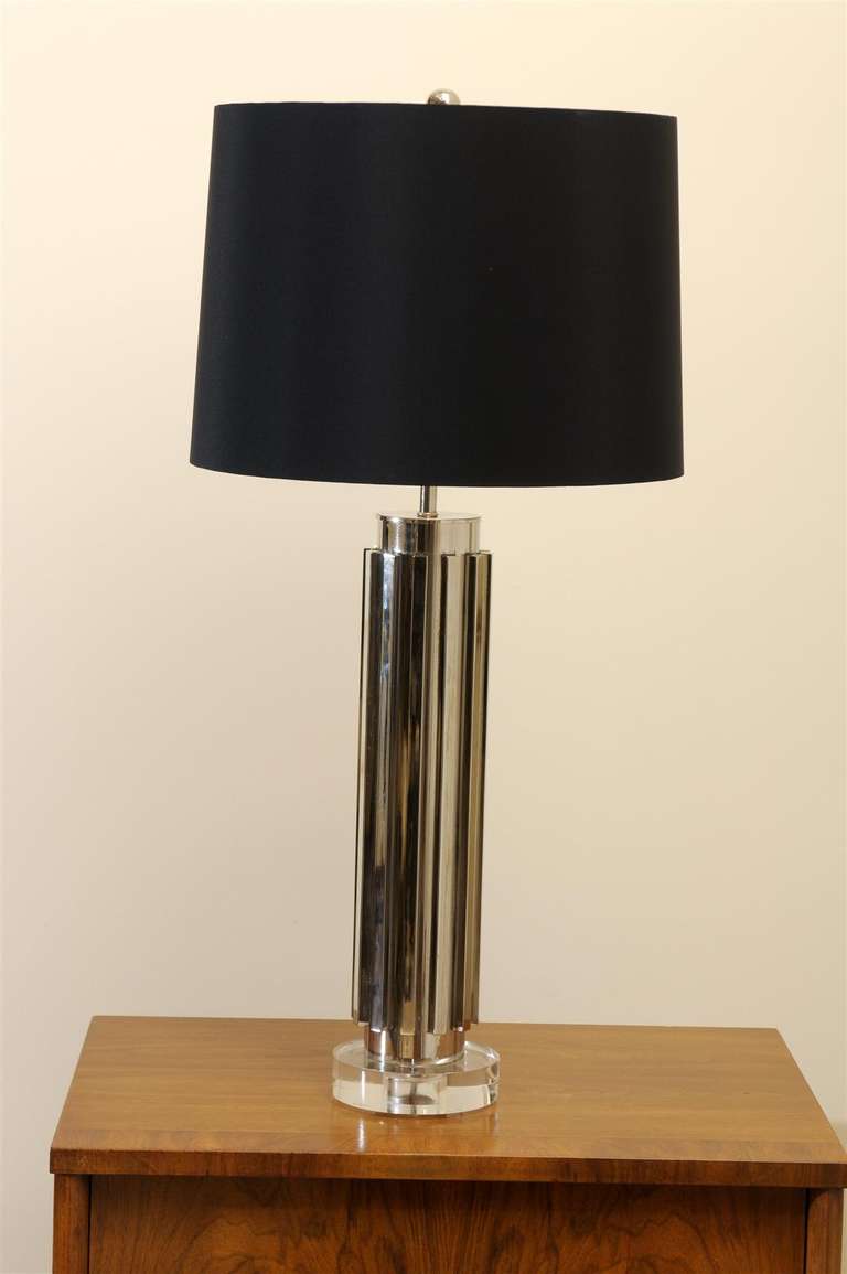 An unique pair of vintage fluted cylinder lamps in nickel, circa 1970's.  These custom made pieces were commissioned by a storied Atlanta designer for a long ago project. Sophisticated, beautifully crafted jewelry that will bring glamour to any room