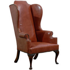 Leather Queen Anne Style Wing Chair in Burnished Orange with Nailhead Trim